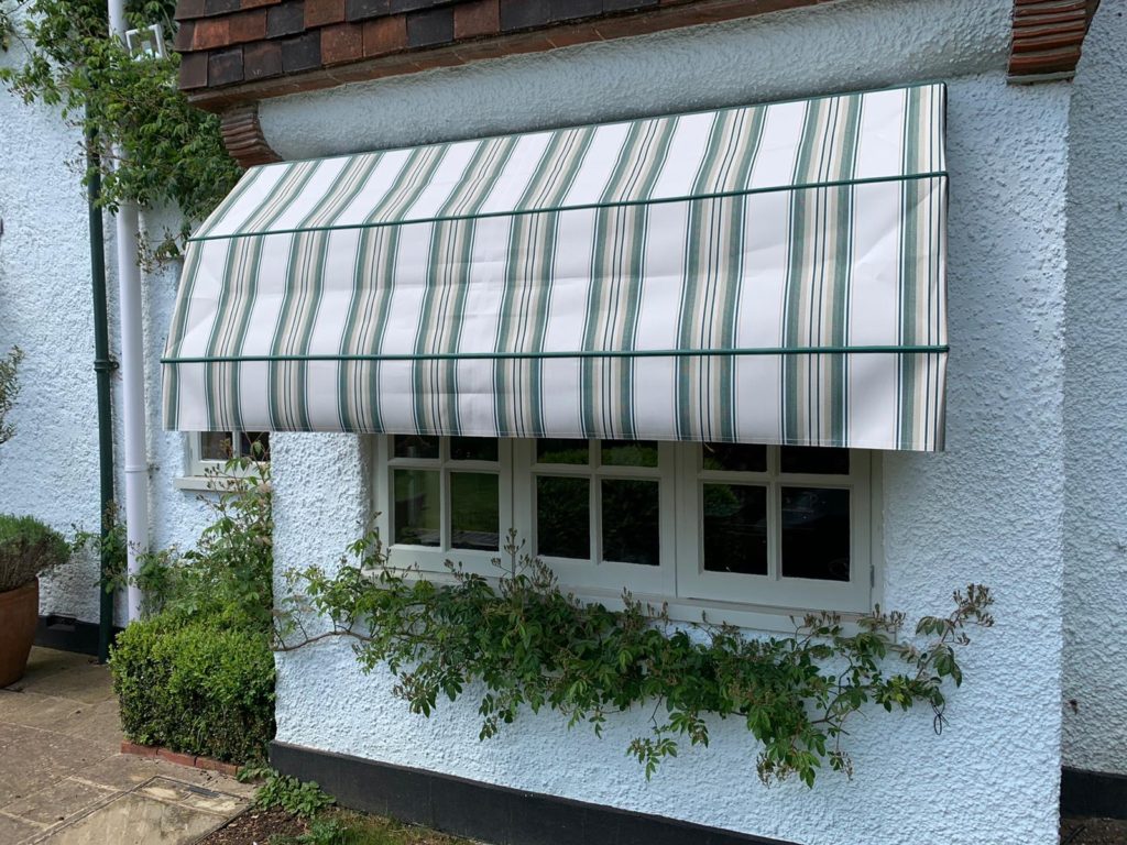 Dutch blind with white and grey stripes