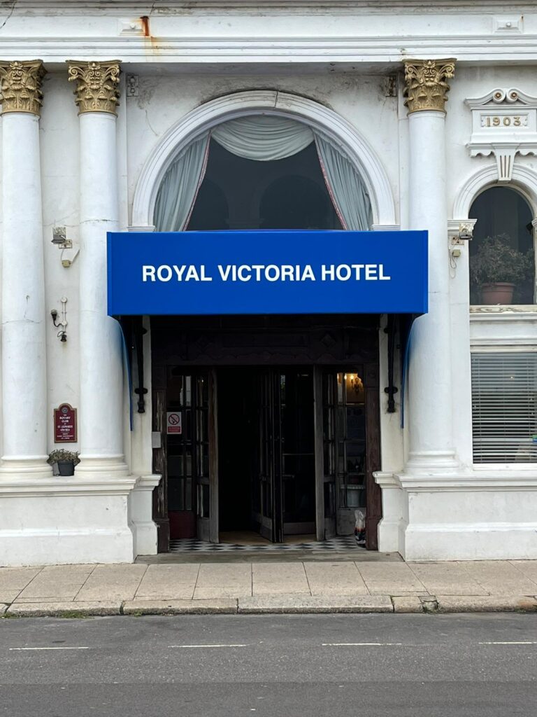 Front view of blue hotel canopy