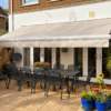Motorised Awning Recover in Thames Ditton, Surrey – A Fresh New Look for an Existing Awning